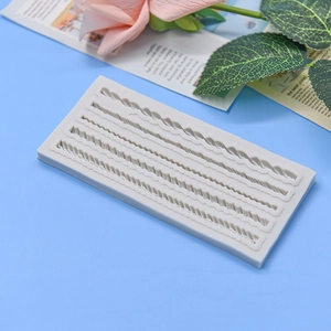 Grey silicone rope texture mold with diverse braided patterns for DIY cake baking