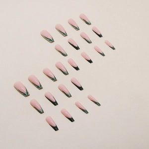 Long coffin press-on nails featuring light pink base and green striped French tip design