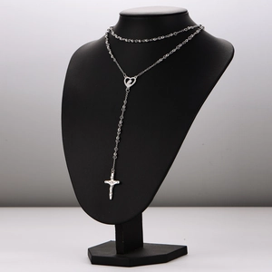 Polished silver 304 stainless steel rosary necklace with cross and heart charms on bust