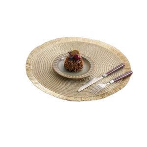 Gold round tassel placemat with woven metallic fibers for festive table decoration