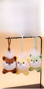 Close-up of cute plush pony pendants in brown, yellow, and green with braided straps