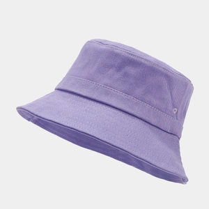 Detailed view of purple bucket hat stitching and breathable vent holes on canvas fabric