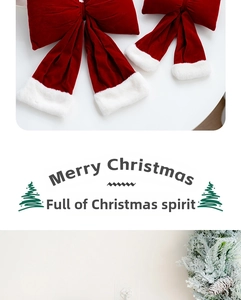 Detail of red velvet Christmas bows with white plush edges for tree decoration