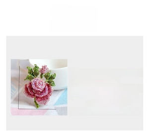 Detailed size measurement chart of pink rhinestone rose flower brooch with green leaves