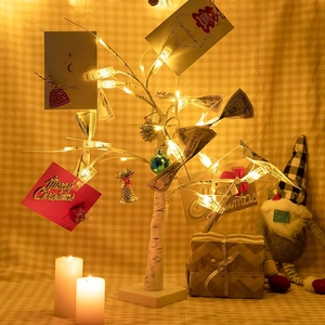 LED birch tree money clip with blue ornaments and bells for festive tabletop decor