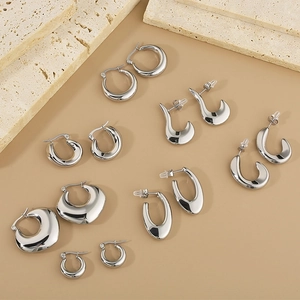 Minimalist silver oval geometric hollow stainless steel earrings with mirror finish