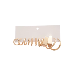 Golden C-shaped geometric earring set with minimalist hoops on a white background