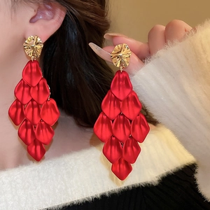 Exaggerated red acrylic petal tassel earrings with elegant gold irregular metal studs