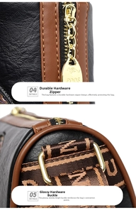 Detail of gold metal zipper with kangaroo logo and textured leather on cylinder bag