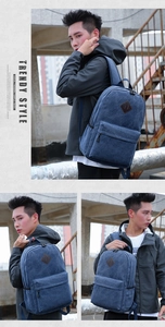 Blue canvas backpack featuring a front zipper pocket with decorative diamond leather patch