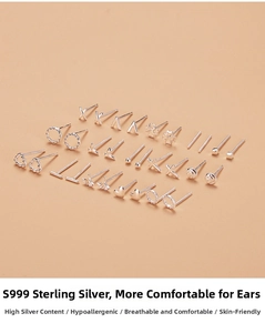 Macro shot of S999 silver earrings set with heart, clover, and cross geometric designs