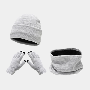 Detail of grey knitted winter set showing thick fleece lining on hat, scarf and gloves