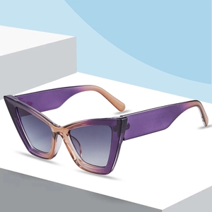 Modern oversized triangle cat eye sunglasses with purple pink gradient frame and grey lenses