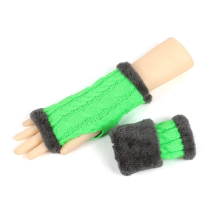 Close-up of green cable-knit fingerless gloves with soft grey faux fur trim on cuffs