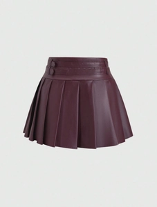 Detail of high-waist wine red PU leather pleated skirt with decorative belt buckles