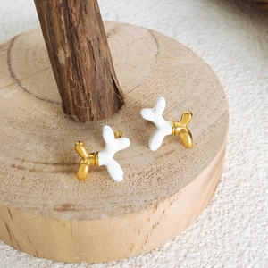 Minimalist gold-plated titanium balloon dog stud earrings with white enamel finish