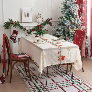 Tovaglia natalizia con campane ricamate e fiocchi di neve su pizzo beige chiaro