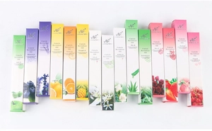 Macro shot of assorted Cuticle Revitalizer Oil pens in colorful boxes on white background