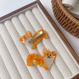 Two-piece set of cute Corgi acetate hair clips in orange and white marble textures
