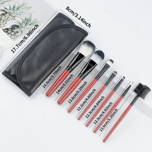 8-piece professional makeup brush set with mahogany handles and black travel storage pouch
