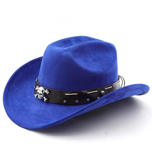 Detail of blue suede cowboy hat featuring black leather band and silver skull ornament