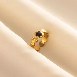 French vintage 304 stainless steel gold open ring with black enamel inlay on beige fabric