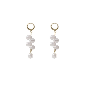 Baroque pearl drop earrings with five irregular white pearls on a gold metal hook