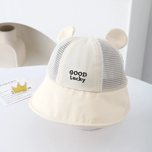 Detail of baby sun hat with cute ears, mesh paneling and GOOD Lucky embroidery
