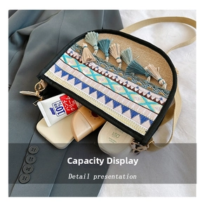 Detail of bohemian saddle bag showing large capacity for essentials like phone and cosmetics