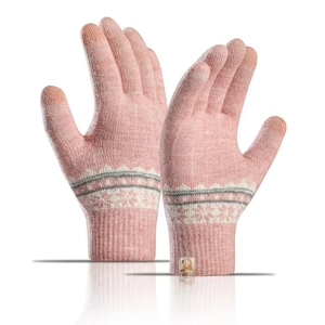 Detail of pink knitted gloves with nordic snowflake patterns and touchscreen fingertips