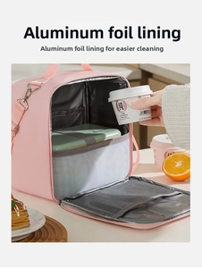 Pink thermal lunch bag detail showing silver aluminum foil lining for insulation