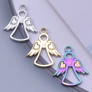 Detailed macro view of 18k gold and silver plated angel pendants for DIY necklaces