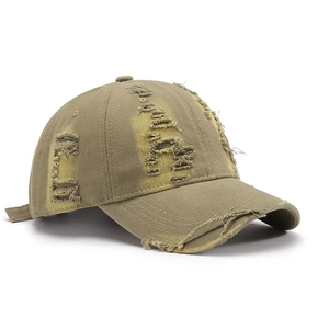 Vintage khaki distressed baseball cap with ripped details and retro washed cotton fabric
