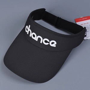 Close-up of black sports sun visor with white chance lettering and breathable texture