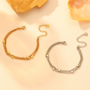 Bracciale a doppio strato in acciaio inossidabile con cuori in oro e argento e marchio S.STEEL