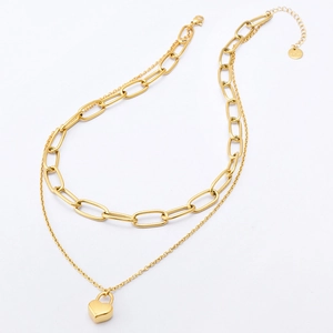 Double-layered gold chain necklace with a heart lock pendant in minimalist hip-hop style