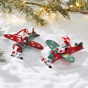 Iron airplane Christmas ornaments with Santa and Snowman figures on artificial snow