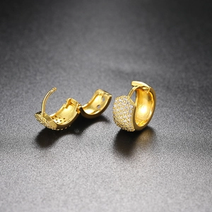 Iced out gold hoop earrings with 5 rows of micro-paved zircons in a hip hop style