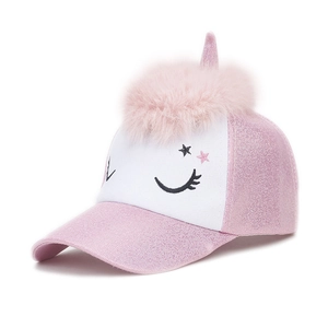 Detail of pink unicorn kids baseball cap with glitter fabric and fluffy pom-pom mane