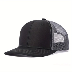 Detail of classic black and grey trucker hat with breathable mesh and curved brim