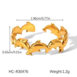 Detailed top view of a gold dolphin wrap ring in stainless steel with dimension specs