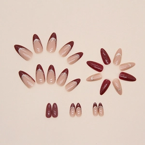 Sparkling wine red almond press-on nails with champagne glitter and French tips