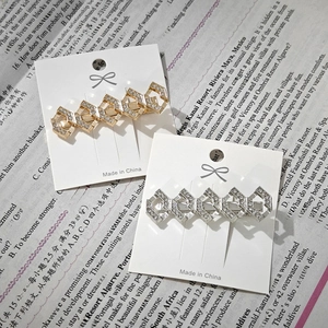 Minimalist geometric hexagon hair clips in gold and silver finish with sparkling rhinestones