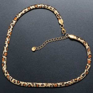 Golden 6mm flat leopard print snake bone chain necklace in a heart-shaped layout