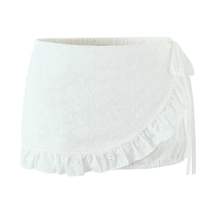 Women's white wrap mini skirt with floral embroidery and ruffle trim details