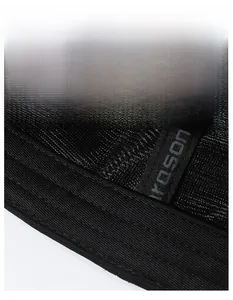 Detail view of widened sweatband and breathable mesh fabric on black baseball cap
