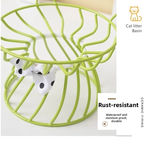 Waterproof green wire pet feeder stand with a decorative black and white polka dot bow