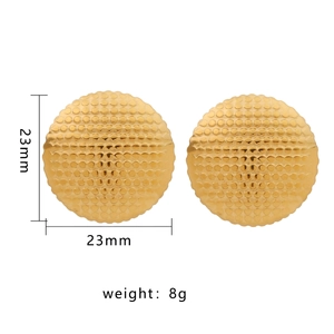 Detailed view of 23mm golden textured heart earrings with weight and size markings