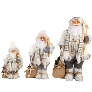 Trois figurines de Père Noël nordiques blanc et gris avec skis en bois de tailles variées