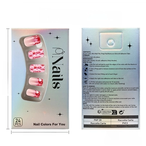 Detail view of the packaging for heart pattern press on nails with full application kit